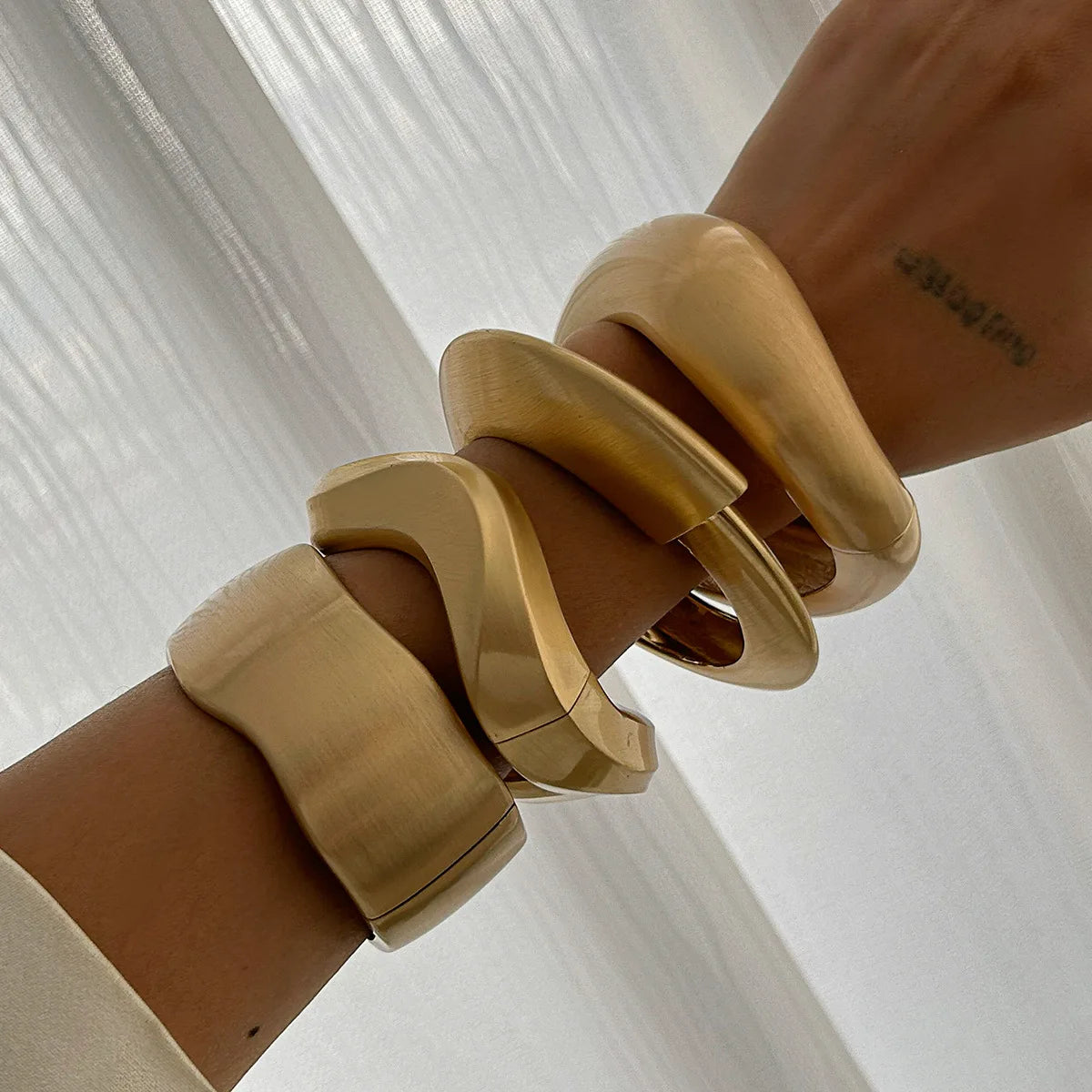 Rizana wide metal Gold color bracelet